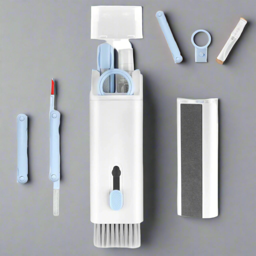 7-in-1 Keyboard Cleaning Kit with a variety of tools including a spray bottle, cleaning brush, and individual cleaning components laid out on a white background.