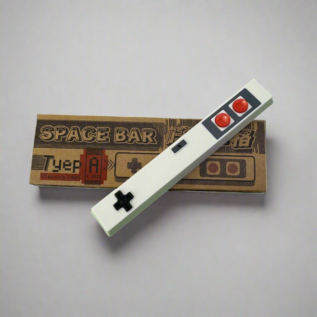Retro styled spacebar keycap with red and white buttons and a black crosshair on a white background, accompanied by a vintage-themed box with the text 'SPACE BAR' and 'Typewriter'.